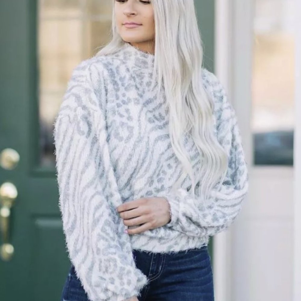 Animal print mock neck sweater